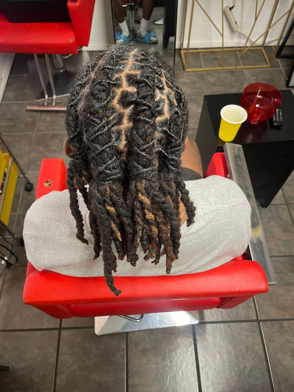 Beautiful locs retwist hairstyle - East Tucson salon