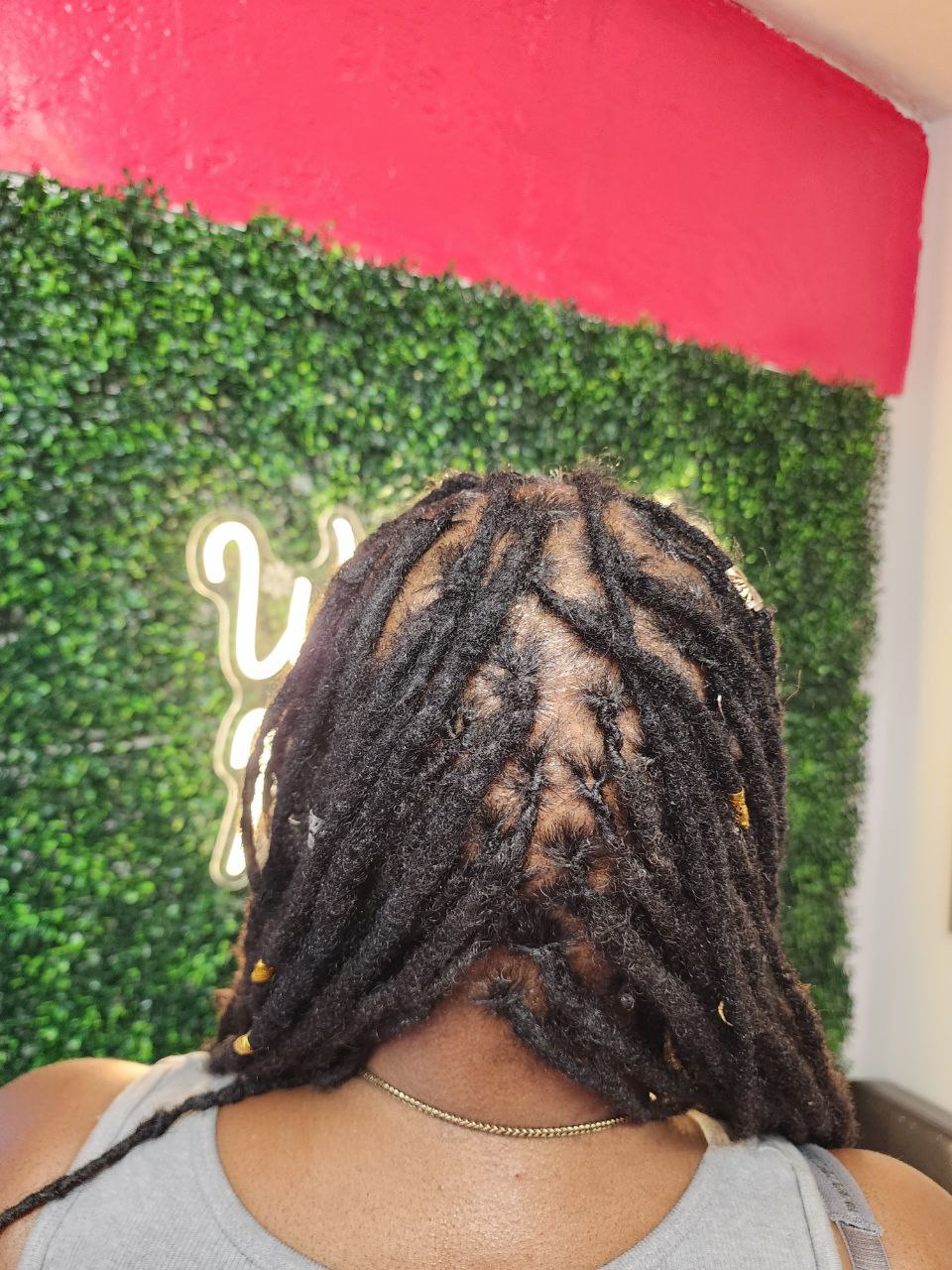 Professional locs retwist for natural hair in Tucson AZ